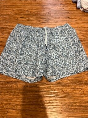 Southern Tide Light Blue Fish-Print Swim Trunks
With Liner
Length: 6in